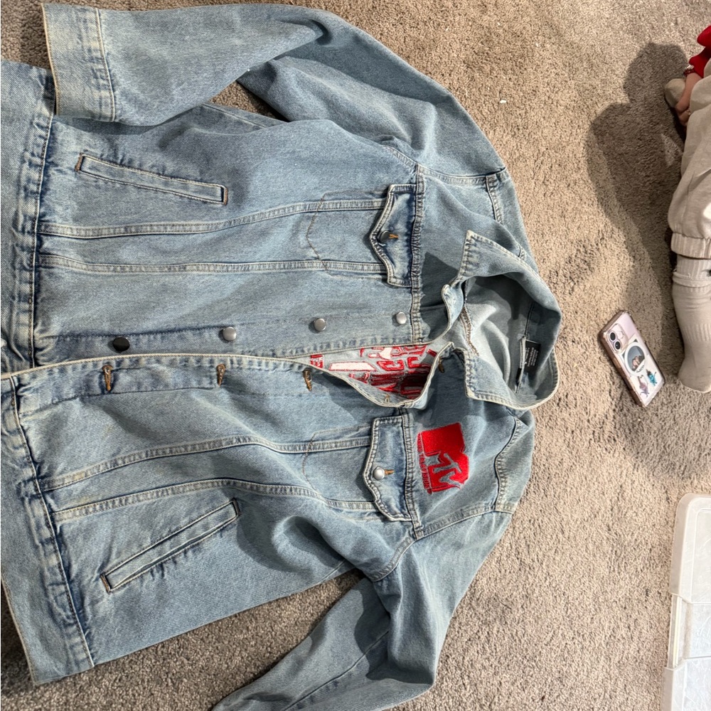 Blue Denim Jacket with Red Patch